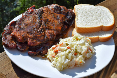 Pork steaks with slaw and white bread