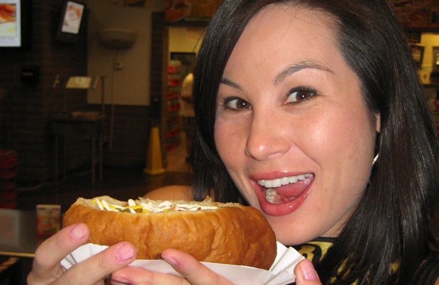 David Raichlen's Fiance Eating the Sonoran Dog