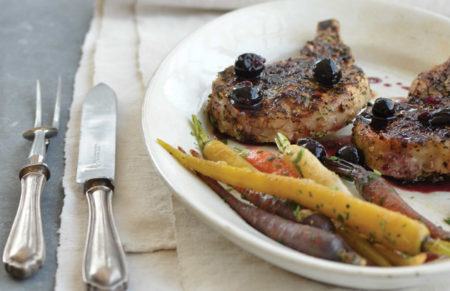 Sage Rubbed Pork Chops with Blue Cheese and Concord Grapes