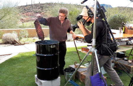 Steven Raichlen using a Pit Barrel Cooker on the set of Project Smoke