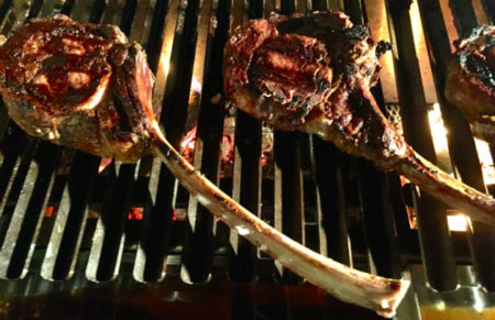 Tomahawk steak on grill