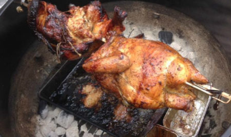 Chicken roasting on spit