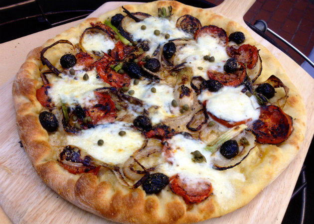 Pizza on wooden peel