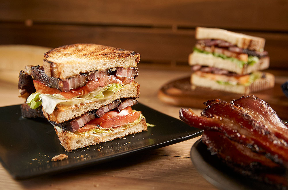 https://d21klxpge3tttg.cloudfront.net/wp-content/uploads/2022/06/The-Ultimate-BLT-with-Home-Cured-Salt-and-Pepper-Bacon-.jpg