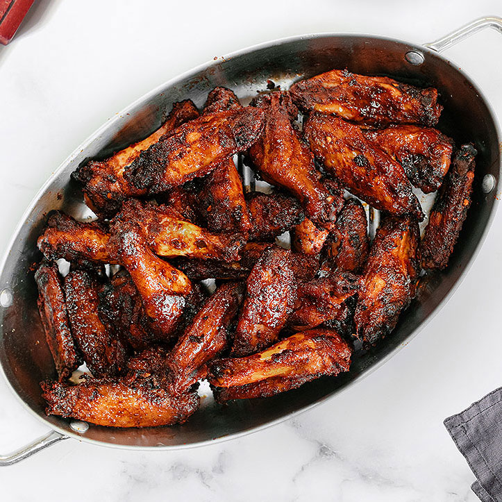 https://d21klxpge3tttg.cloudfront.net/wp-content/uploads/2023/02/Sriracha-Wings_Chicken_Product_Planet-BBQ_800.jpg